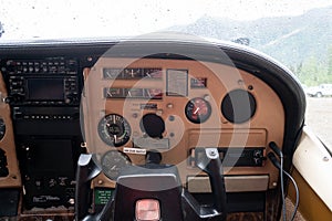 Cockpit copilot view of the instrument panel of Cessna airplane bush plane in Alaska