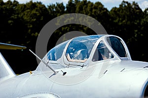 Cockpit of an old silver Russian fighter jet