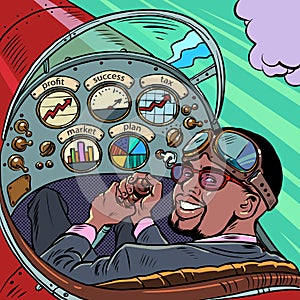 cockpit of a retro aircraft, the african american pilot leads the airplane. Pilot profession