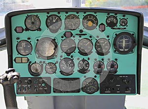 The cockpit of a Russian helicopter with control devices the names of the devices are written in Russian