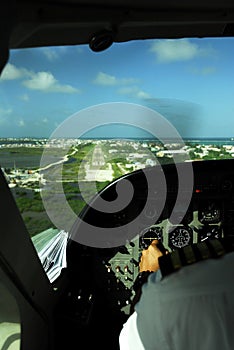 Cockpit view of plane landing in belize