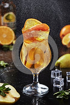 Cocktail with Aperol spritz, apple cider, pear syrup photo