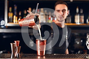 Cocktail Bar. Bartender Making Cocktails At Bar Counter