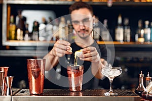 Cocktail Bar. Bartender Making Cocktails At Bar Counter