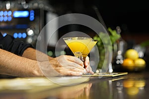 Cocktail on the bar. Close-up.