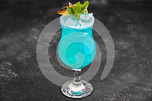 Cocktail Blue Lagoon without entourage on a dark background