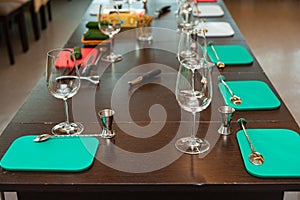 Cocktail class setup with bar tools and glasses