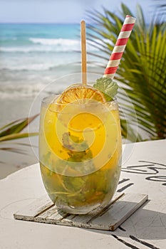 Coconut on the sand and exotic