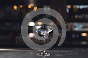 Cocktail glass on bar