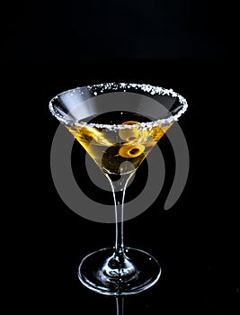 Cocktail glass with martini and olives