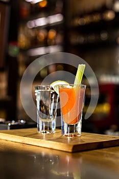 Cocktail in a glass with Tobasco and alcohol.