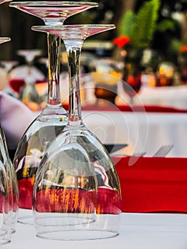 Cocktail glasses for two. Evening dinner tables alfresco.