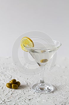 Cocktail Margarita with lime and lemon on the table