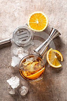 Cocktail Old fashioned Negroni with orange on the bar counter