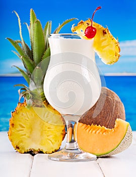 Cocktail pina colada with fresh fruits photo