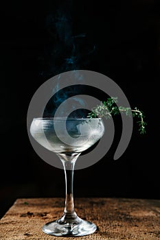 Cocktail preparation with torched thyme