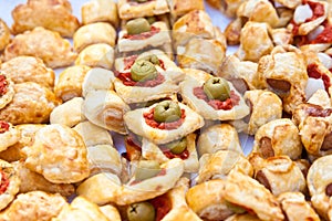 Cocktail snacks background on white table
