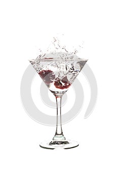 Cocktail with splash on white background