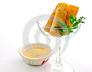 Cocktail springroll with sweet plum sauce