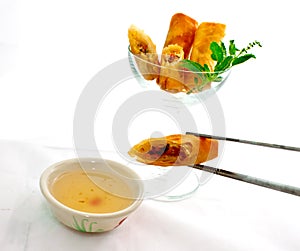 Cocktail springroll with sweet plum sauce