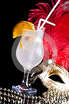 Cocktail and Venetian mask