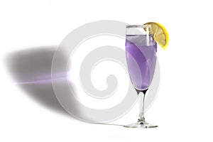Cocktail violet and a slice of lemon in a glass photo