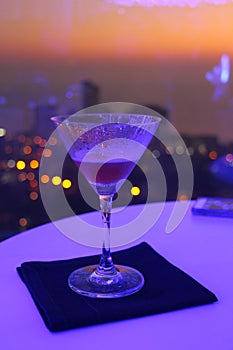 Cocktails on Balcony of Skycraper with Sunset photo