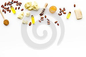 Cocoa butter as ingredient for natural cosmetics. White background top view copy space