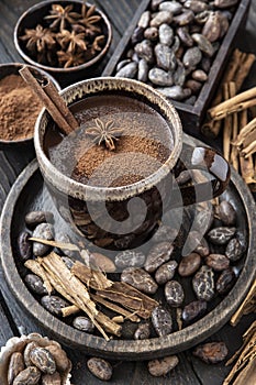 Cocoa drink on wooden rustic background