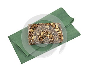 Cocoa honey peanut granola bar on napkin