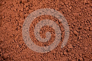 cocoa powder in a bowl shot on a macro lens, powder for making chocolate.