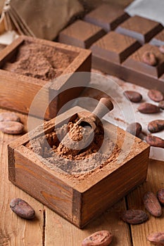 Cocoa powder, chocolate bar and cocoa beans