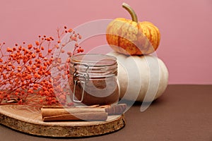 Cocoa Powder, cinnamon sticks, Ripe pumpkins