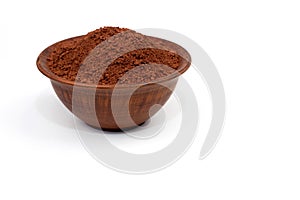 Cocoa powder in a clay plate