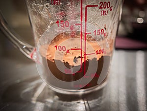 Cocoa Powder in Measuring Cup