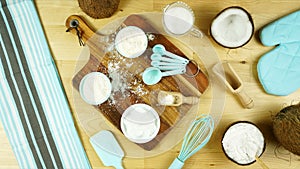 Coconut baking theme flat lay creative layout overhead with coconut products.