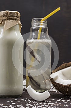 Coconut beverage, coconuts and coconut flakes. Coconuts and coconut flakes