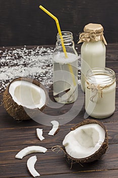 Coconut beverage, coconuts and coconut flakes. Coconuts and coconut flakes