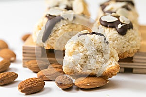 Coconut biscuits with almonds isolated on a white background, closeup