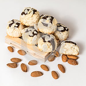 Coconut biscuits with almonds isolated on a white background, closeup, square picture