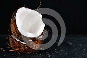 Coconut on black background