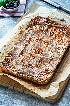 Coconut and blackcurrant tart