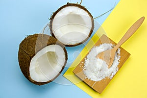 coconut and cocnut flakes on a yellow and blue background