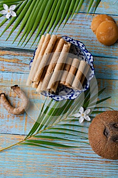 Coconut crispy roll in thaistyle bowl. a traditional thai dessert called `Thong Muan`