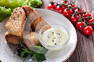 Coconut crusted salmon fillet with tartar sauce