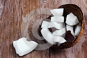 Coconut cut in half with coconut stripes - chips