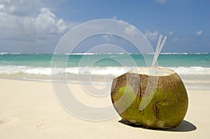 Coconut drink on exotic beach