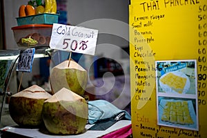 Coconut drink put on display for sale at Phi Phi Island in Thailand
