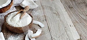 Coconut flour in a wooden bowl close up