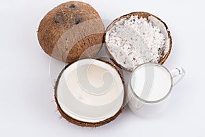 Coconut and a glass of coconut milk